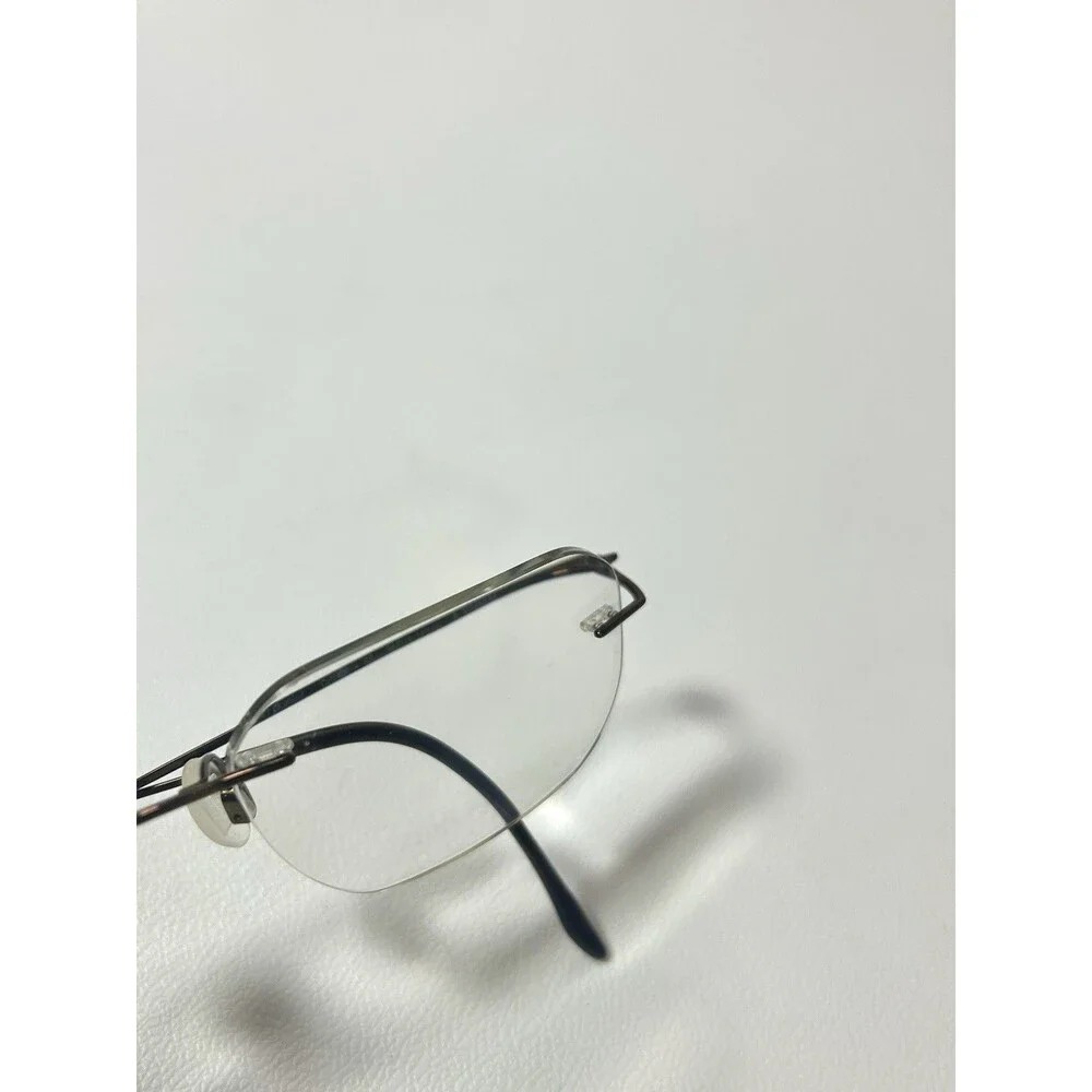 Charmant CH8600 Rimless Brown Titanium Eyeglasses 99-19-140mm